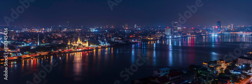 Stylized Night Panorama of Phnom Penh's Illuminated Cityscape © Pierre Villecourt