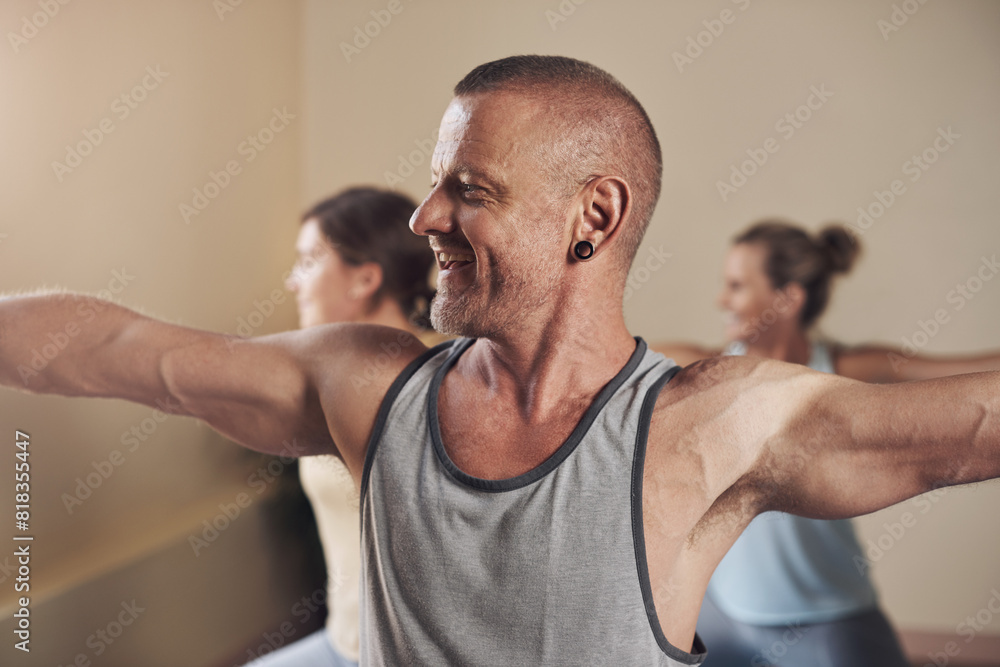 Happy man, yoga and warrior pose in class for health, wellness and body flexibility for practice routine. Smile, male yogi or person in pilates session for mindfulness, wellbeing or balance in studio Happy man, yoga and warrior pose in class for health, wellness and body flexibility for practice routine. Smile, male yogi or person in pilates session for mindfulness, wellbeing or balance in studio