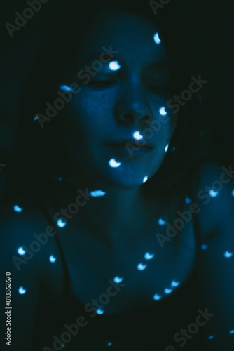 Wallpaper Mural Woman in blue glow contemplating light spots Torontodigital.ca