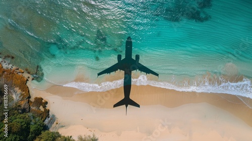 shadow of an big airplane at the beach, shore line, top view, copy and text space, 16:9