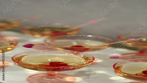 Glassesfilled with champagne with cherries