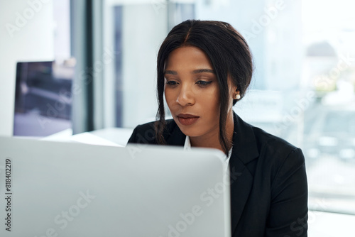 Computer, business and black woman with reading in office, confidence and research for finance and investment. Workplace, accounting and broker of firm with desktop, pc and online in job of startup