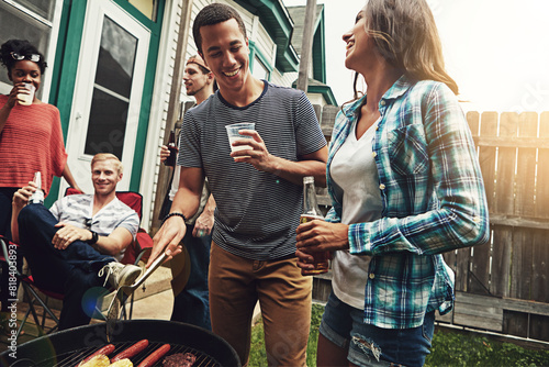 Friends, people and beer in backyard with bbq for social event, party and celebration with laughing for joke. Group, drinking alcohol or food with relax, funny conversation and diversity at reunion photo