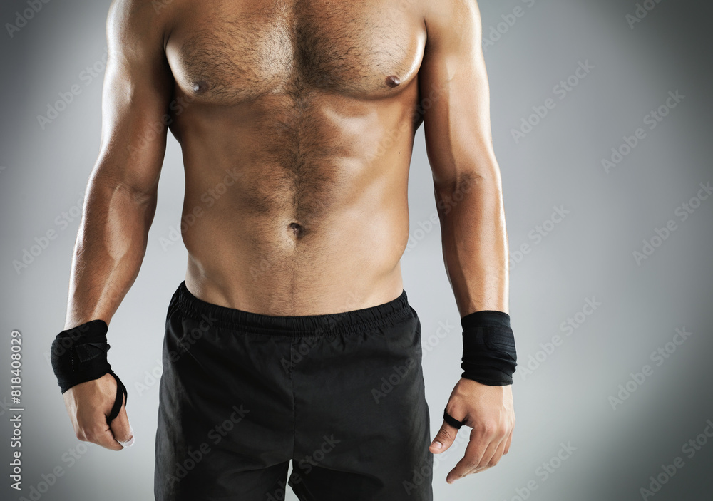 Man, studio and torso for boxer, fitness and prepare for workout or fight training. Athlete, body and muscle for power, exercise and sport for boxing health and wellness isolated on grey background Man, studio and torso for boxer, fitness and prepare for workout or fight training. Athlete, body and muscle for power, exercise and sport for boxing health and wellness isolated on grey background