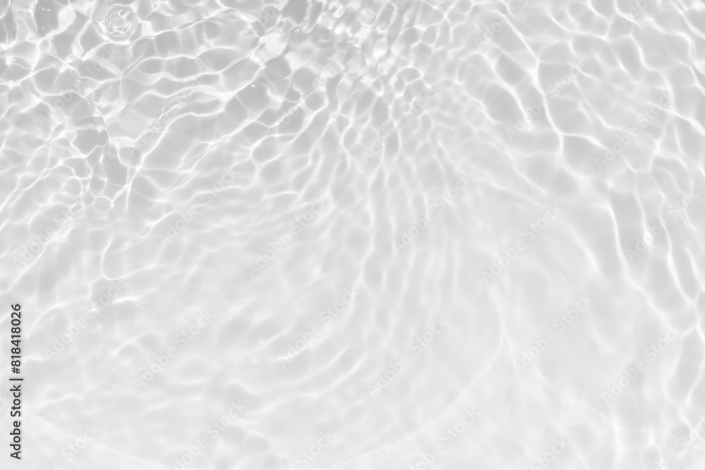 White water with ripples on the surface. Defocus blurred transparent white colored clear calm water surface texture with splashes and bubbles. Water waves with shining pattern texture background. White water with ripples on the surface. Defocus blurred transparent white colored clear calm water surface texture with splashes and bubbles. Water waves with shining pattern texture background.