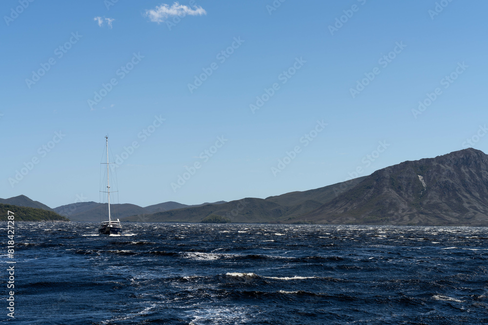 sailing on a yacht in the australian in the remote forest wilderness in spring in australia