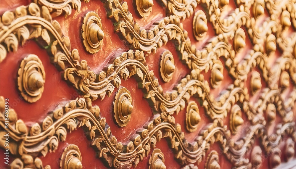 Ornate Golden Pattern on Red Surface