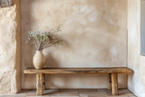 Rustic wood bench against beige stucco wall with copy space. Japandi interior design of modern entrance hall.