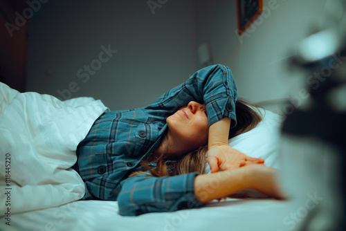 Tired Woman Trying To Seep Suffering from Insomnia. Unhappy girl unable to rest feeling stressed and depressed 
