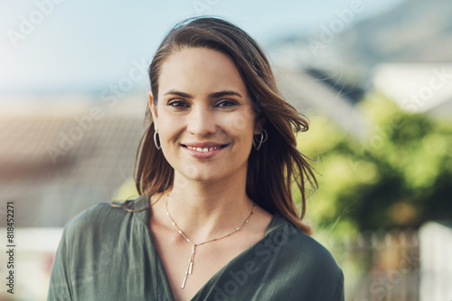 Woman, portrait and happy outdoor for relax with confidence, pride and summer holiday in nature. Person, smile and calm on rooftop for vacation, weekend off and resting with adventure or sightseeing
