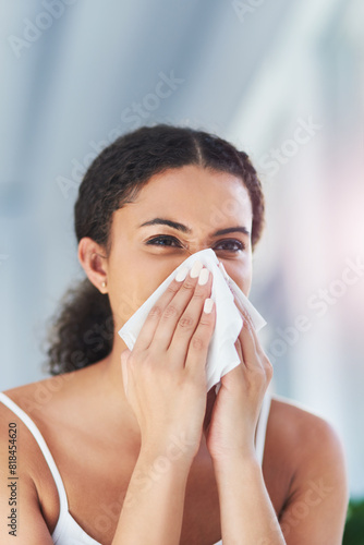 Allergy, tissue and woman with sneeze, sick and cold with bacteria, flu season and health crisis in living room. Apartment, person and girl with congestion, viral infection and home with hay fever