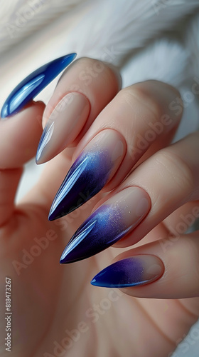 Photo of one hand showcasing cyan, indigo, and blue-beige French trending nail art, featuring perfect long nails on beautiful fingers, captured in realistic and impressive nail photography. 