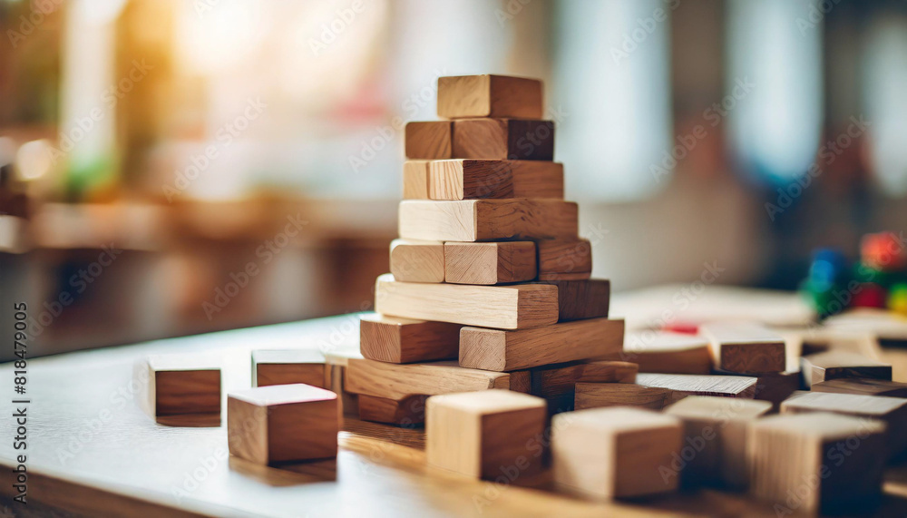 solid wood blocks in various colors stacked on a table, symbolizing creativity and learning in a Montessori-inspired setting. Ideal for educational, childhood development, and playtime themes solid wood blocks in various colors stacked on a table, symbolizing creativity and learning in a Montessori-inspired setting. Ideal for educational, childhood development, and playtime themes