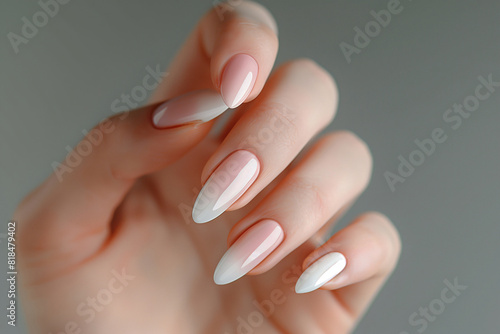 Elegant nude manicure. Long almond-shaped nails.