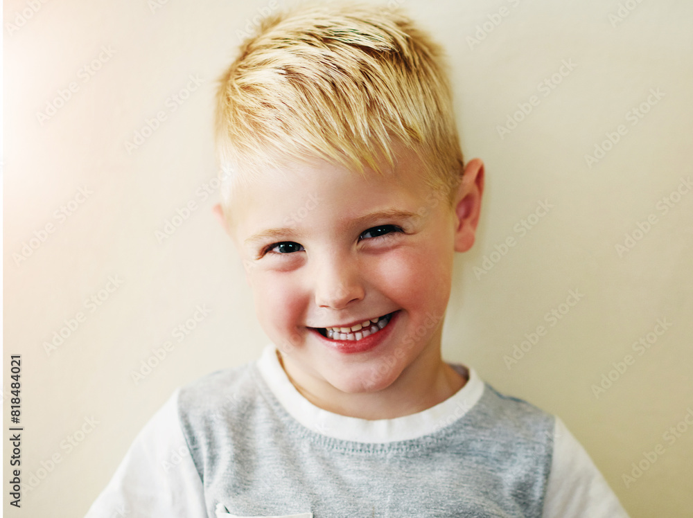 Portrait, boy and smile in studio for wellness and happiness, cute and excited face on white background. Kid, confidence and positive for childhood development, joyful and relaxed expression Portrait, boy and smile in studio for wellness and happiness, cute and excited face on white background. Kid, confidence and positive for childhood development, joyful and relaxed expression