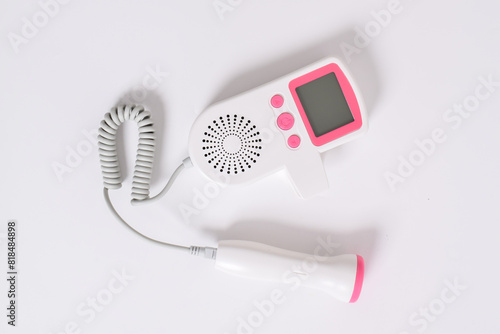 Medical equipment. Fetal doppler isolated on white background, Doppler Fetal heart ultrasonic detectors .Top view photo