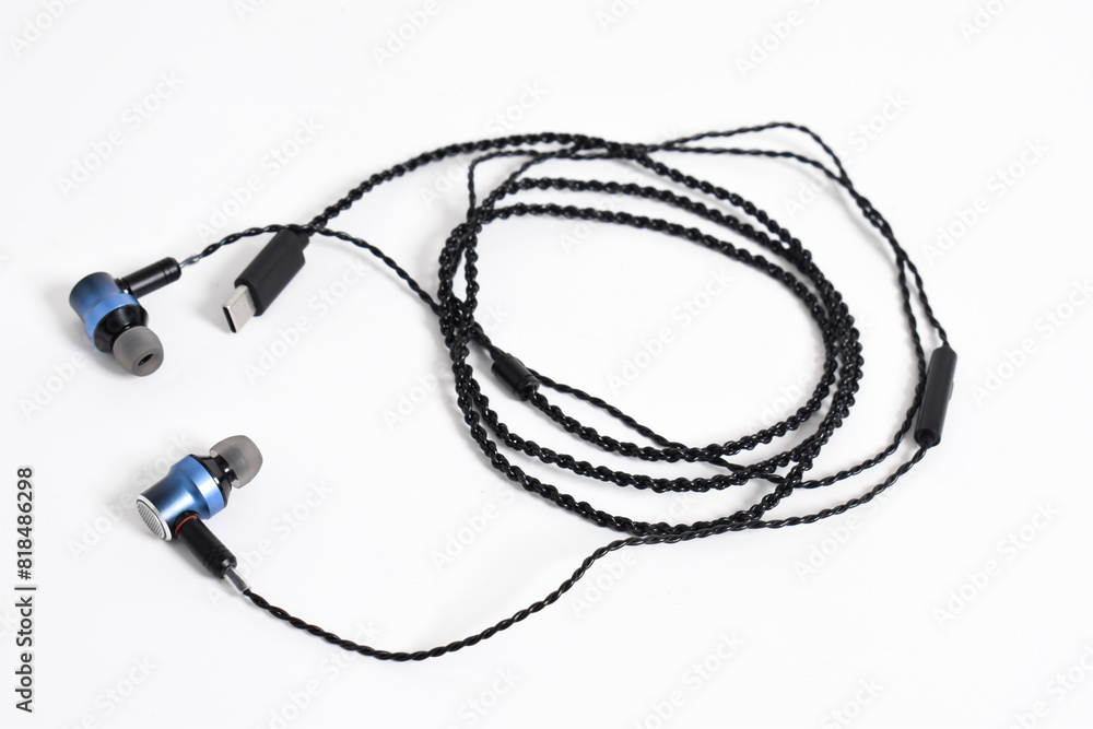 Black modern headphones with a headset isolated on white background. concept of digital music Black modern headphones with a headset isolated on white background. concept of digital music