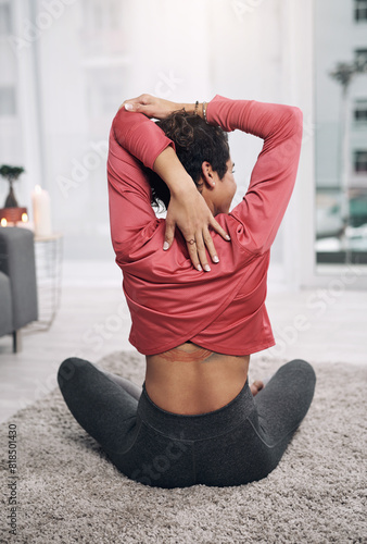 Stretching, triceps and woman exercise for fitness, body health and yoga on floor. Pilates, back and person in living room to warm up arm, relax and holistic balance in lounge for wellness in home