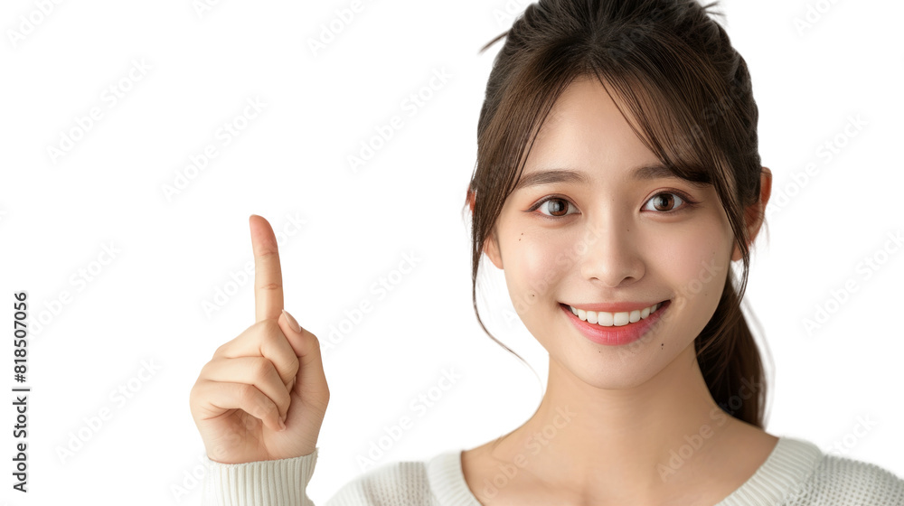 A beautiful woman with a smile points to the blank space next to her A beautiful woman with a smile points to the blank space next to her