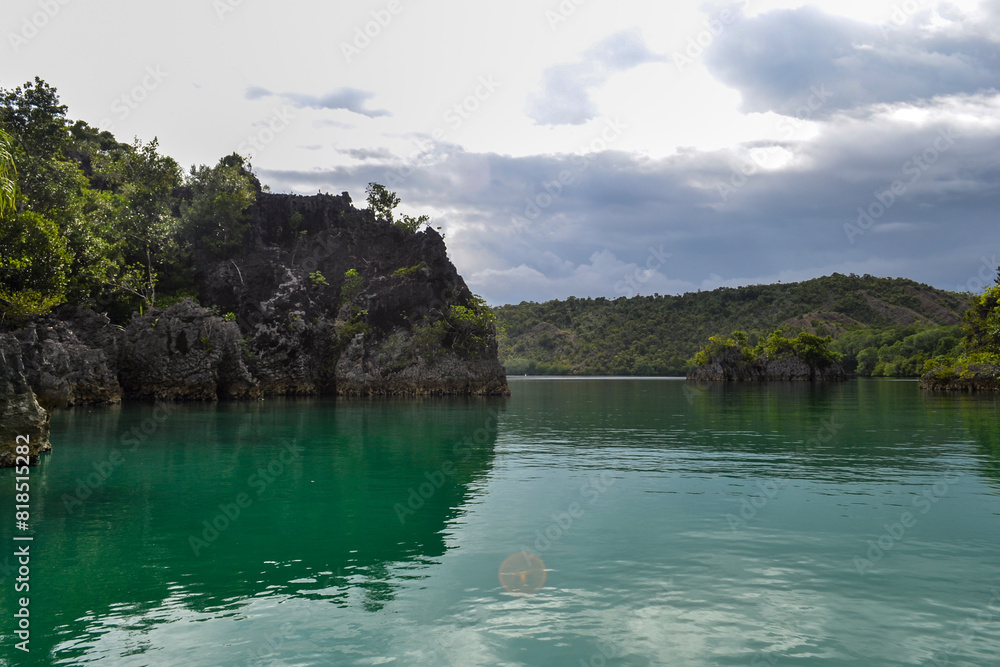The landscape image of the archipelago of Raja Ampat, Southwest Papua, Indonesia. The landscape image of the archipelago of Raja Ampat, Southwest Papua, Indonesia.