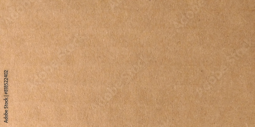 Kraft brown paper texture. Recycled cardboard. Rough textured sheet. Vintage texture