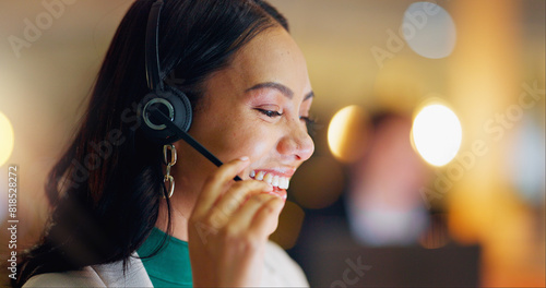 Female person, headphones and microphone with smile on call as contact center, agent or sales representative in office. Woman, happy and consultant as virtual assistant at workplace for tech support