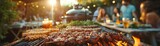 What are some of the most memorable moments from the family party in the large garden, with everyone enjoying grilled meat and drinks