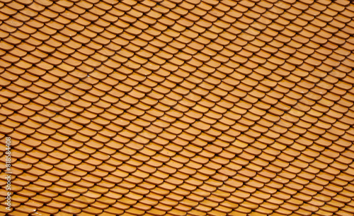 Orange tiles on the roof as an abstract background. Texture