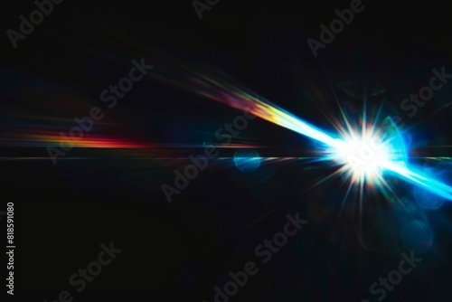 Abstract blurred colorful lens flare bokeh on black