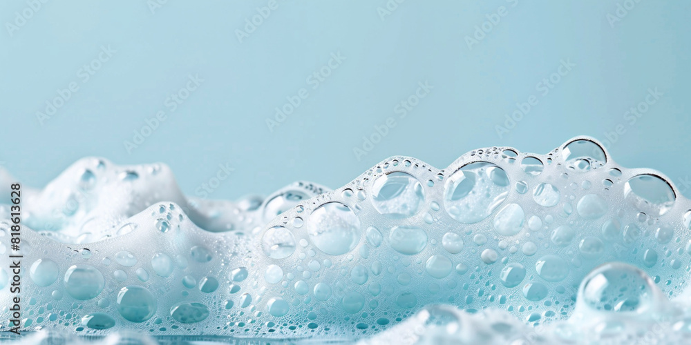 Bubbles with soapy liquid texture. Skin care cleansing cosmetic in top view. Abstract white soap foam bubbles on blue background. Copy paste empty place for text Bubbles with soapy liquid texture. Skin care cleansing cosmetic in top view. Abstract white soap foam bubbles on blue background. Copy paste empty place for text