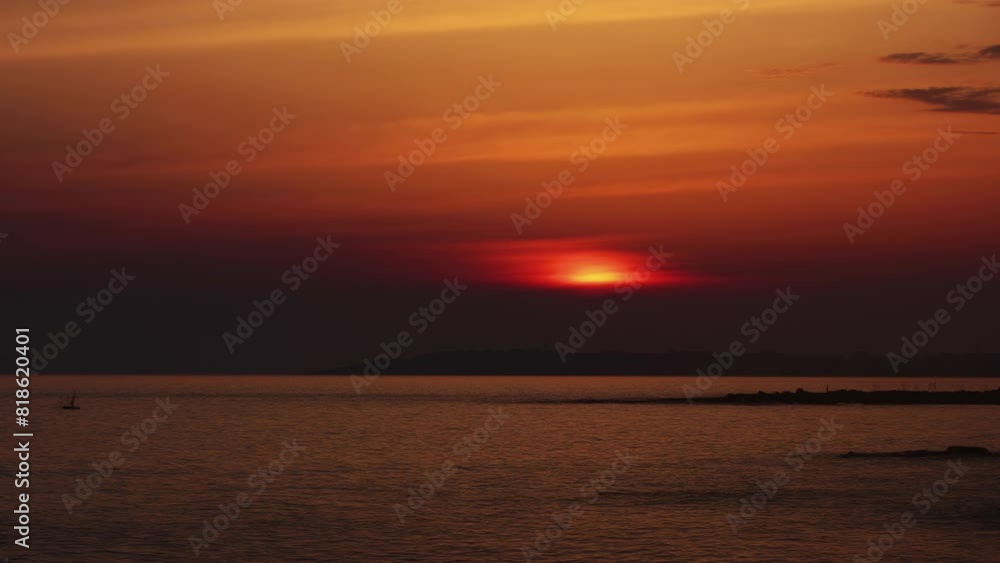 Landscape with sunset sun and clouds over sea, time lapse 4k Landscape with sunset sun and clouds over sea, time lapse 4k