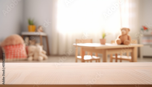 Empty wooden table in baby room interior