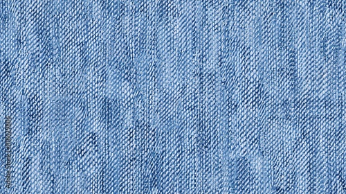 A seamless fabric pattern of denim material in a soft blue hue. photo
