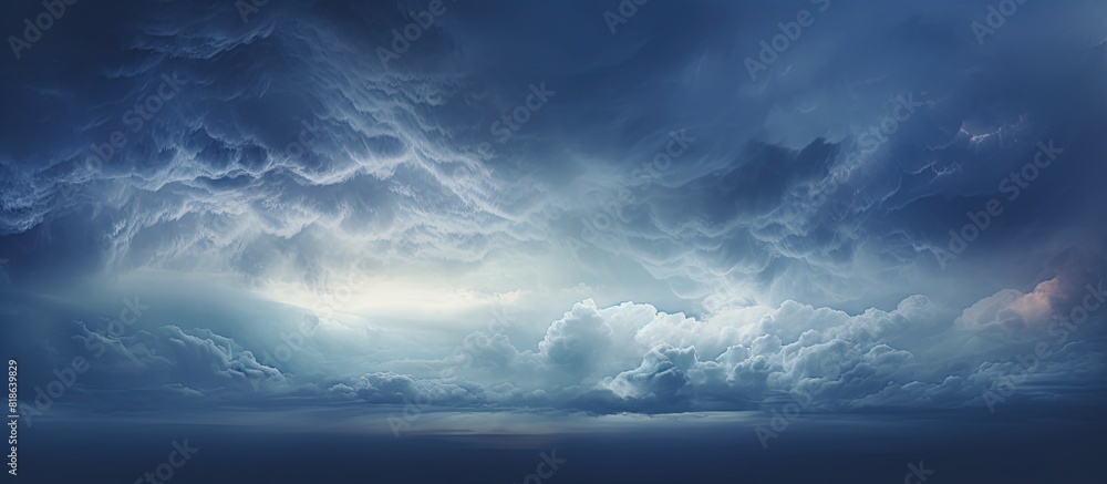 The sky filled with dark blue clouds exudes a gloomy and formidable atmosphere. Creative banner. Copyspace image The sky filled with dark blue clouds exudes a gloomy and formidable atmosphere. Creative banner. Copyspace image