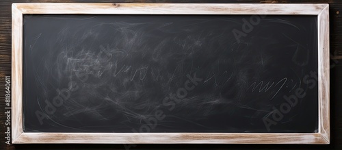 A handwritten exam displayed on a blackboard with white chalk copy space image