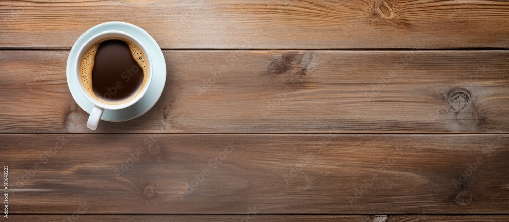 A top down view of an office desk displaying a cup of coffee with ample copy space for a flat lay image A top down view of an office desk displaying a cup of coffee with ample copy space for a flat lay image