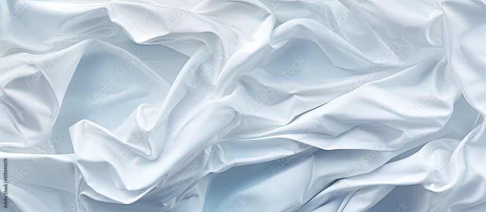 An image of crumpled white paper creating an abstract background with ample copy space An image of crumpled white paper creating an abstract background with ample copy space