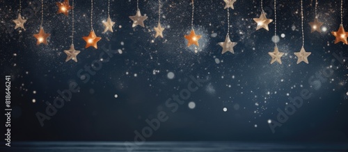 A Christmas themed background with dim lighting against a dark backdrop ideal for adding text Perfect for postcards or posters with ample copy space photo