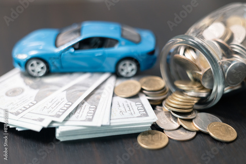 Business concept involved using finance calculator to determine premium for vehicle policy, ensuring clear financial contract for car. Investing in auto insurance can save money on transport costs. photo