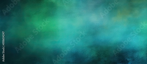 Colorful background with a vibrant blue green texture and a subtle dark vignette The image features a blurred design with ample copy space