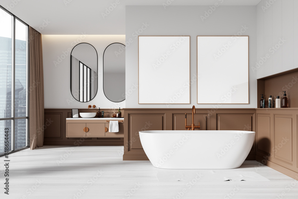 Minimalist bathroom interior with brown cabinets, white bathtub, and blank posters on the wall, light-colored floor, modern home decor concept. 3D Rendering. Minimalist bathroom interior with brown cabinets, white bathtub, and blank posters on the wall, light-colored floor, modern home decor concept. 3D Rendering.