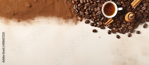 A coffee themed frame showcasing a collection of coffee beans a portafilter tamper ground coffee and spices The image also includes coffee making equipment with ample copy space photo
