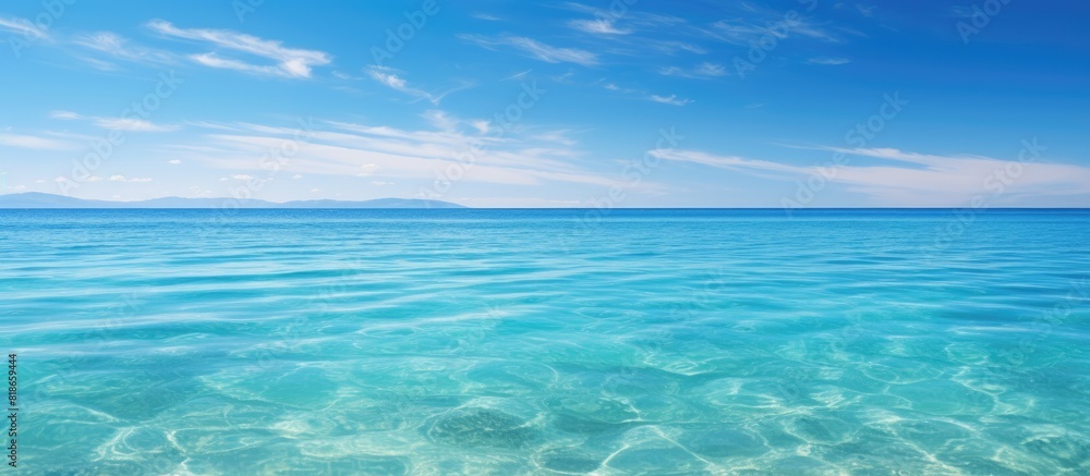 A picturesque tropical sea beneath a clear blue sky perfect for a copy space image