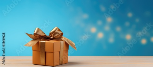 A brown gift box adorned wi...