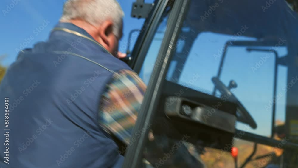 Fieldwork Commencement Elderly Farmer Begins Day by Entering Tractor Fieldwork Commencement Elderly Farmer Begins Day by Entering Tractor