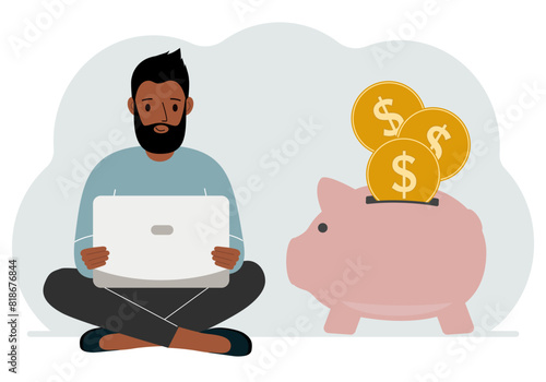 A man sits cross-legged with a laptop next to a pig piggy bank. Earning money, saving, saving money. Vector flat illustration
