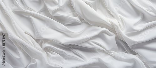 A crumpled fabric texture serves as a background for a copy space image