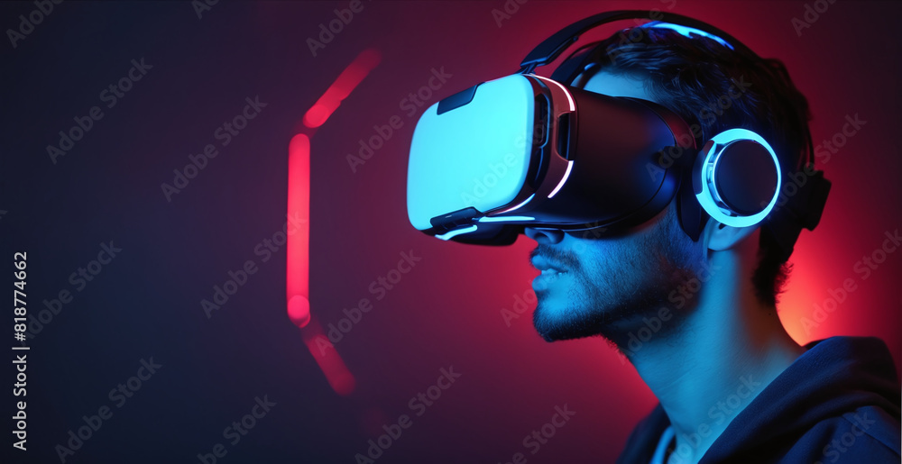 Man in VR Glasses with Neon Background - Futuristic Virtual Reality Experience Man in VR Glasses with Neon Background - Futuristic Virtual Reality Experience