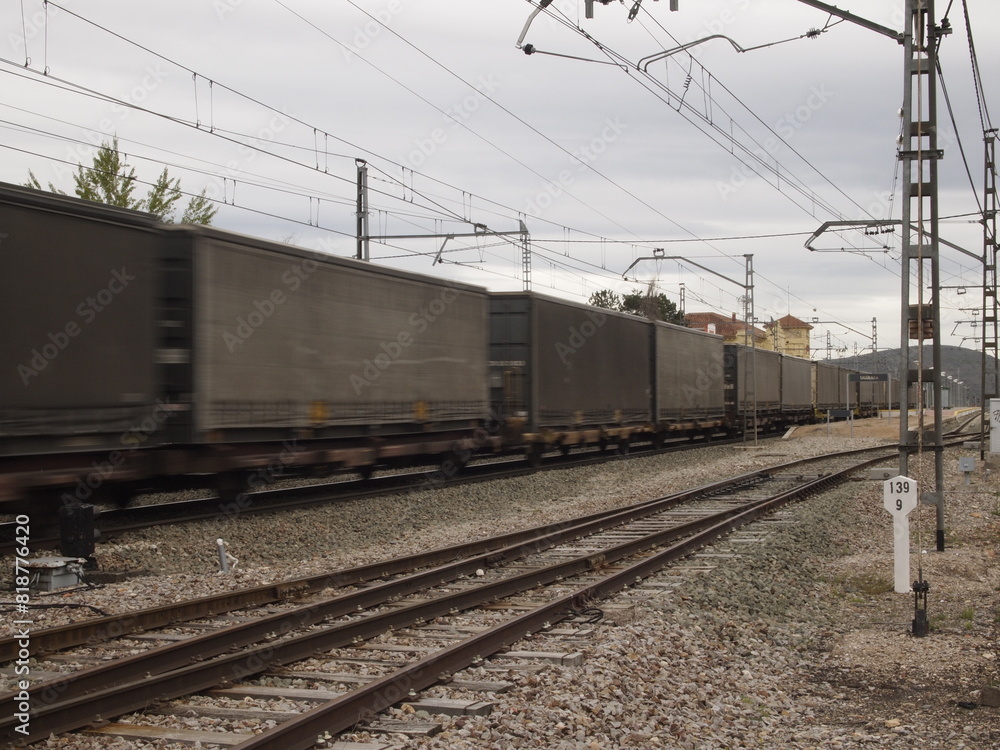 Freight train goes along the railway tracks Freight train goes along the railway tracks