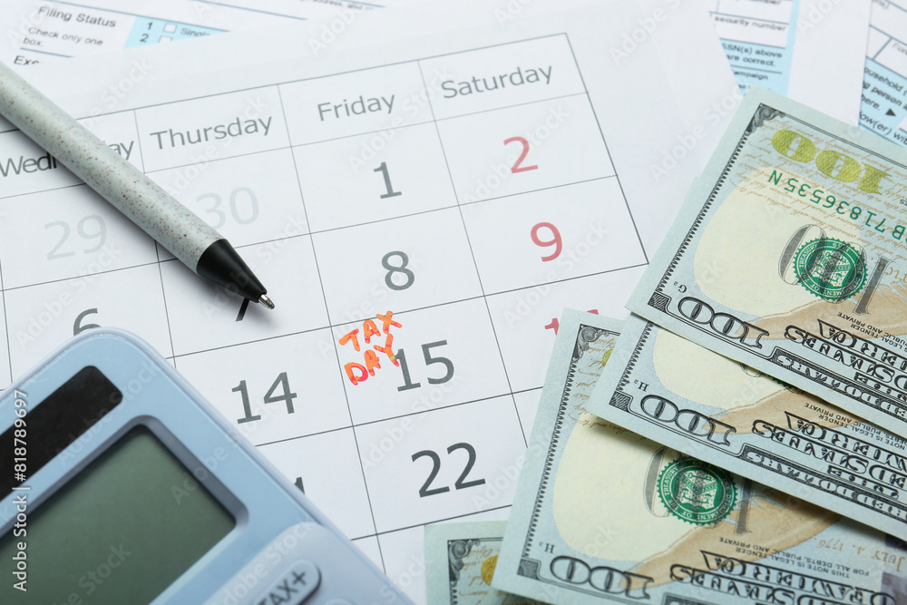 Calendar with date reminder about tax day, documents, money, pen and calculator, closeup Calendar with date reminder about tax day, documents, money, pen and calculator, closeup